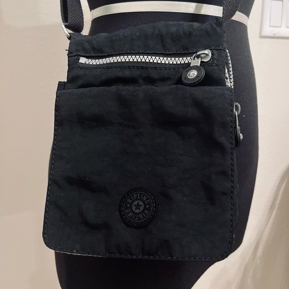 Kipling small crossbody black lots of pockets